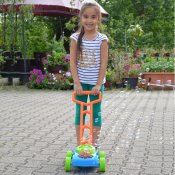 Gräsklippare med såpbubblor